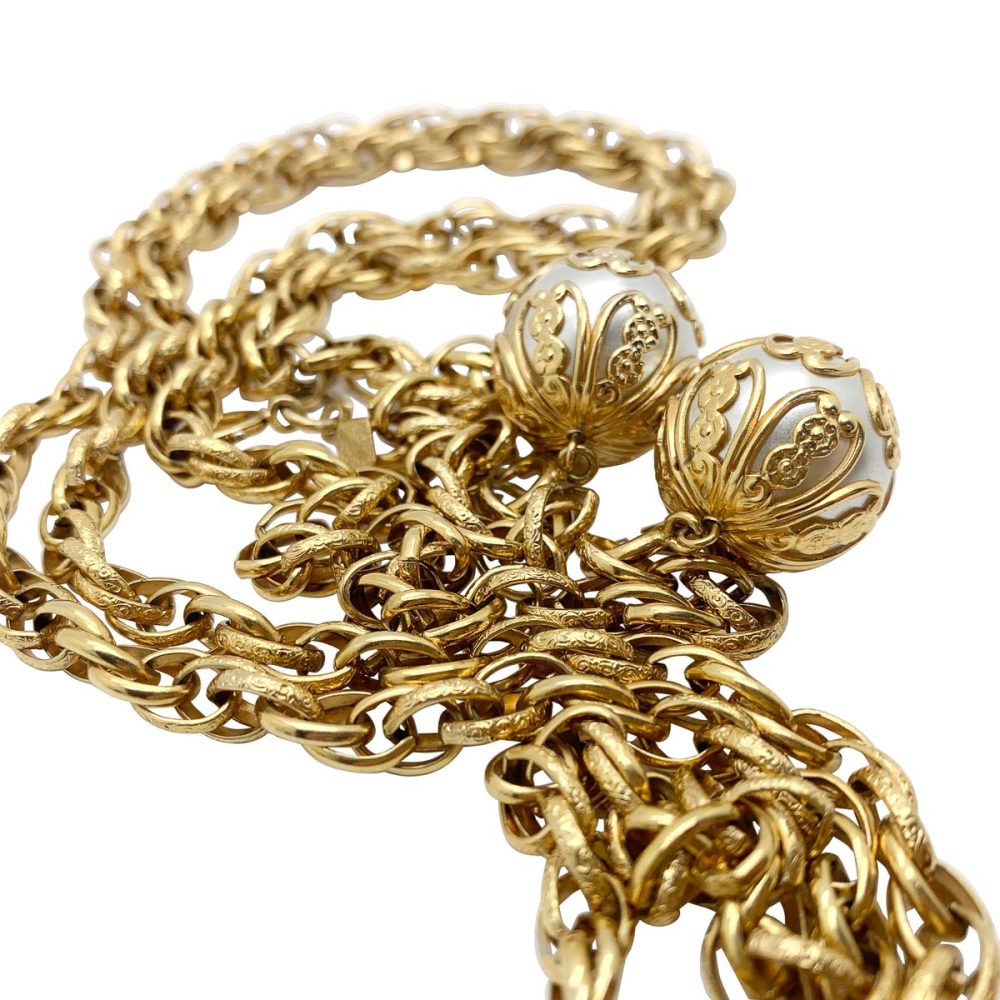 A vintage Sarah Coventry pearl filigree lariat.