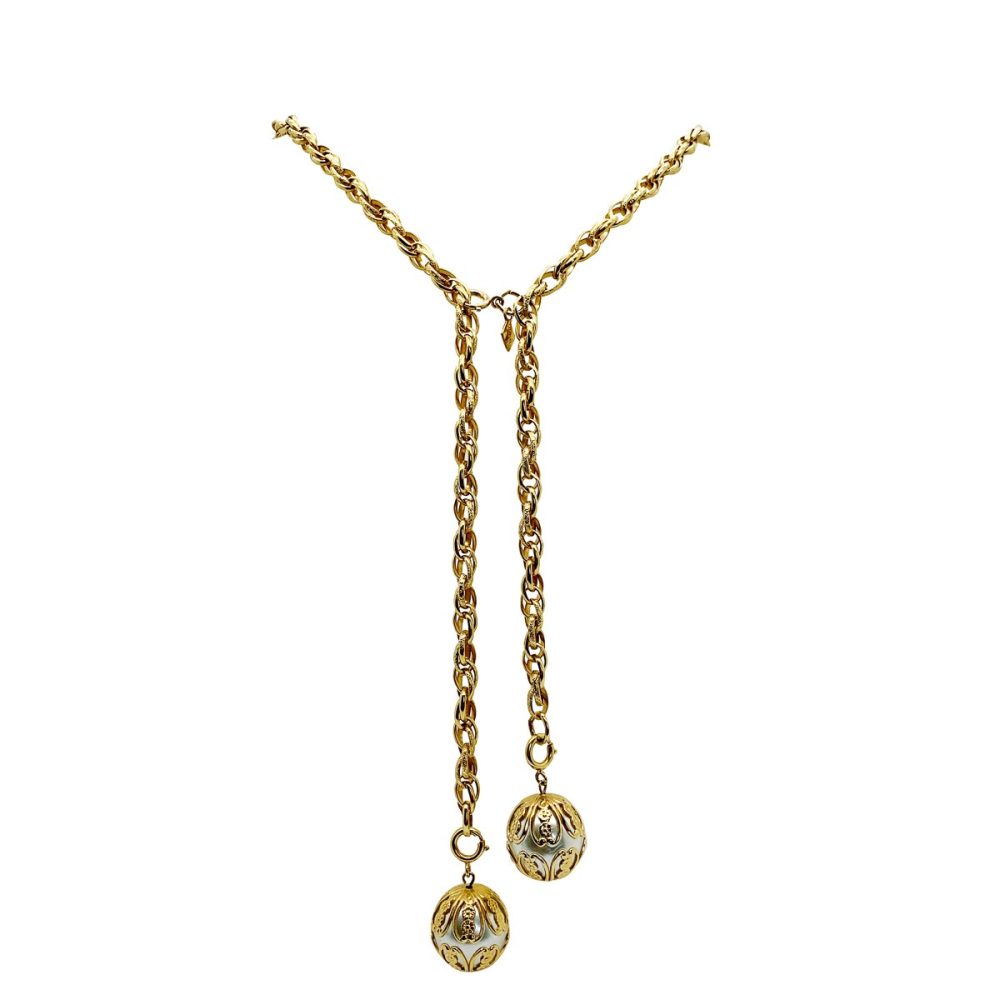A vintage Sarah Coventry pearl filigree lariat.