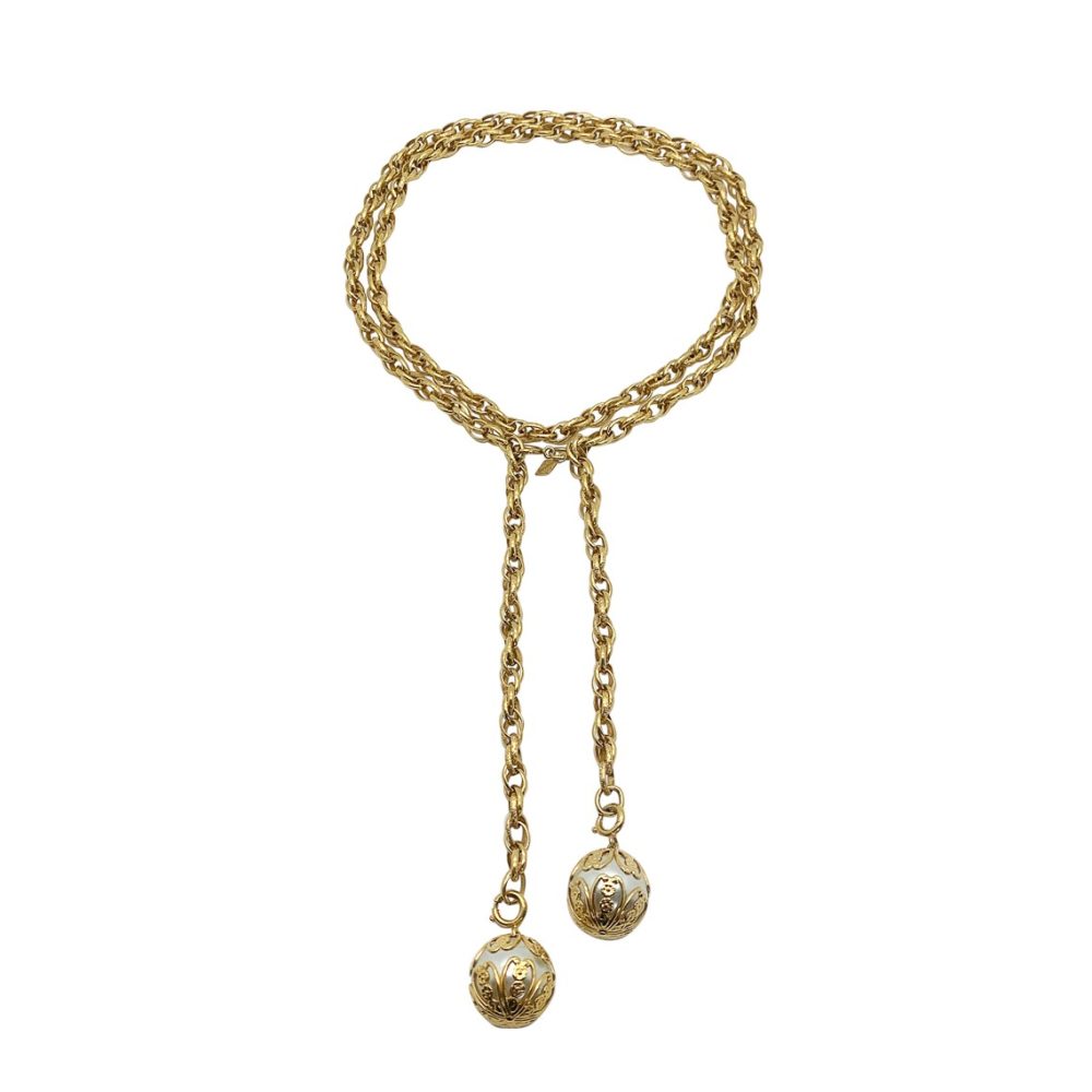 A vintage Sarah Coventry pearl filigree lariat.