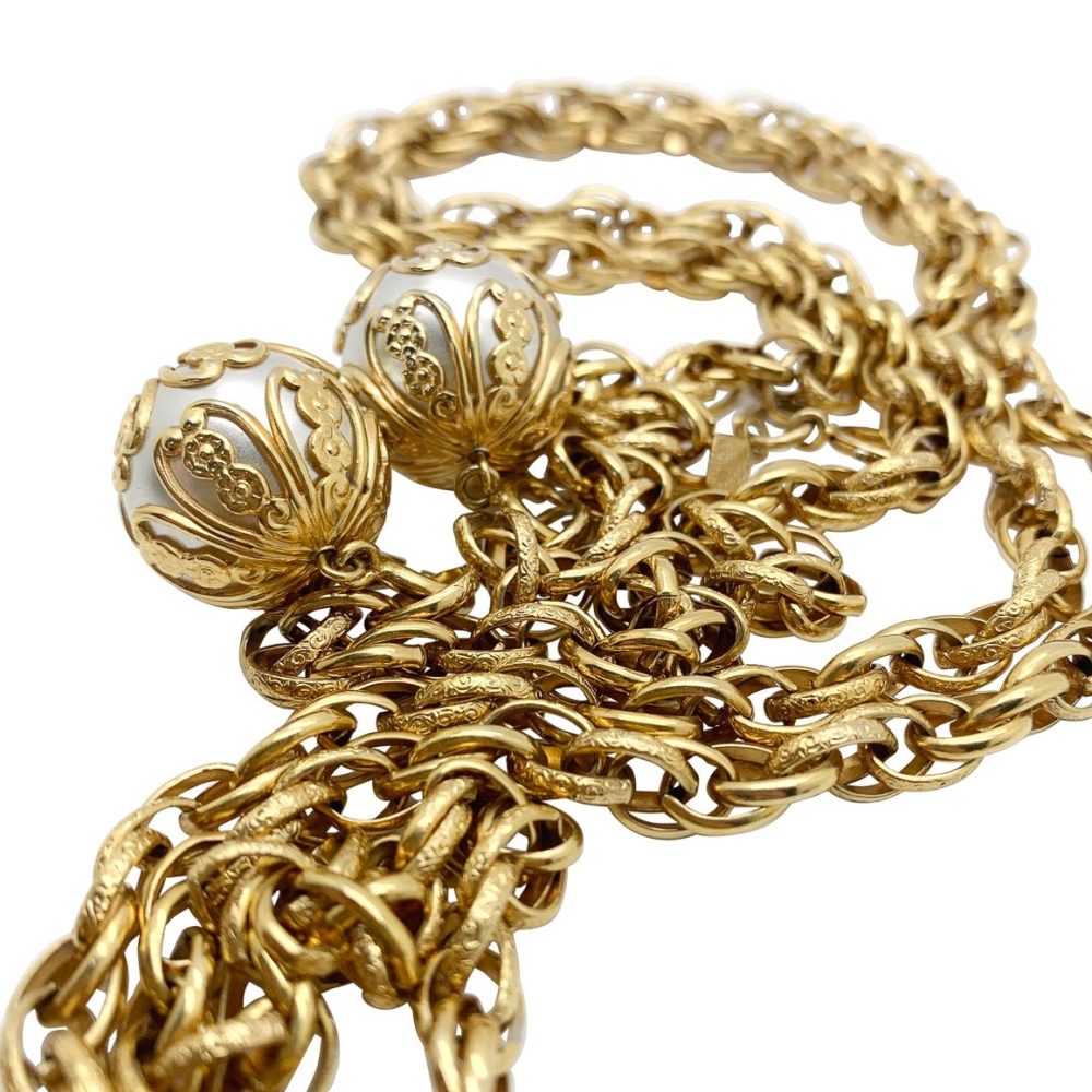 A vintage Sarah Coventry pearl filigree lariat.